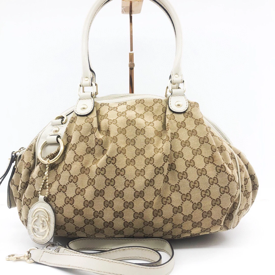 95新 GUCCI/古驰 97新/帆布老花拼皮饺子手提单斜挎包/公价13800