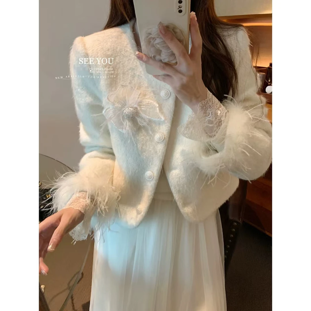 2025年新款羽绒服小香风外套鸵鸟毛袖美气质白色9881