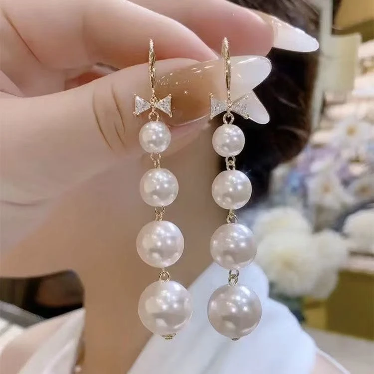 合金耳饰 潮秋冬蝴蝶结珠珠耳环女时尚气百搭显脸瘦优雅精致耳饰