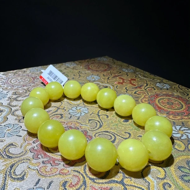 臻藏（8A级）清老黄玉手串2410040073