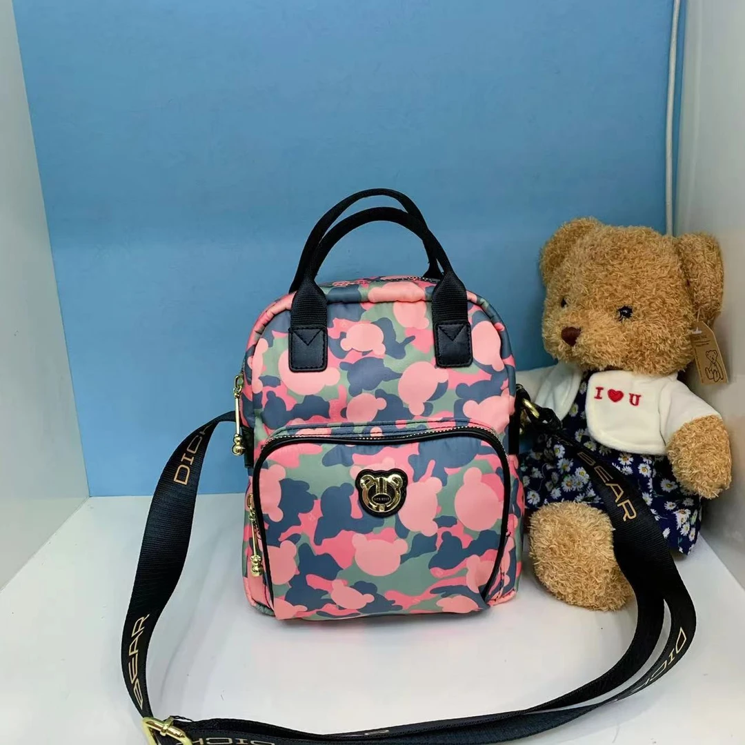 DICK BEAR/迪克熊9253新款时尚竖版防水布料手提斜挎包