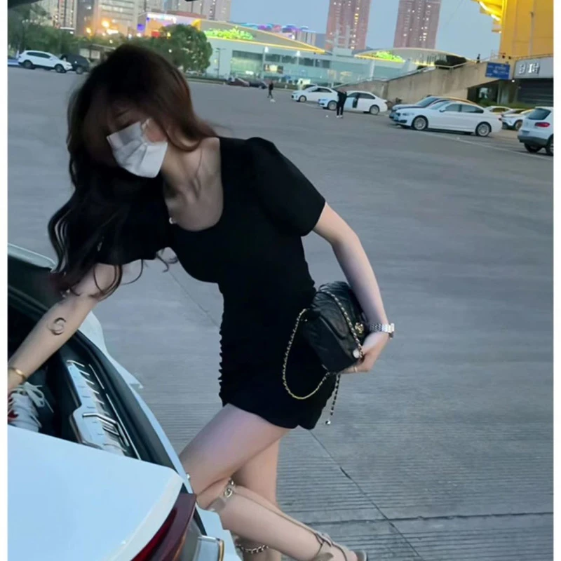 黑色短袖连衣裙女2024年夏季新款设计感镂空气质高腰显瘦包臀短裙