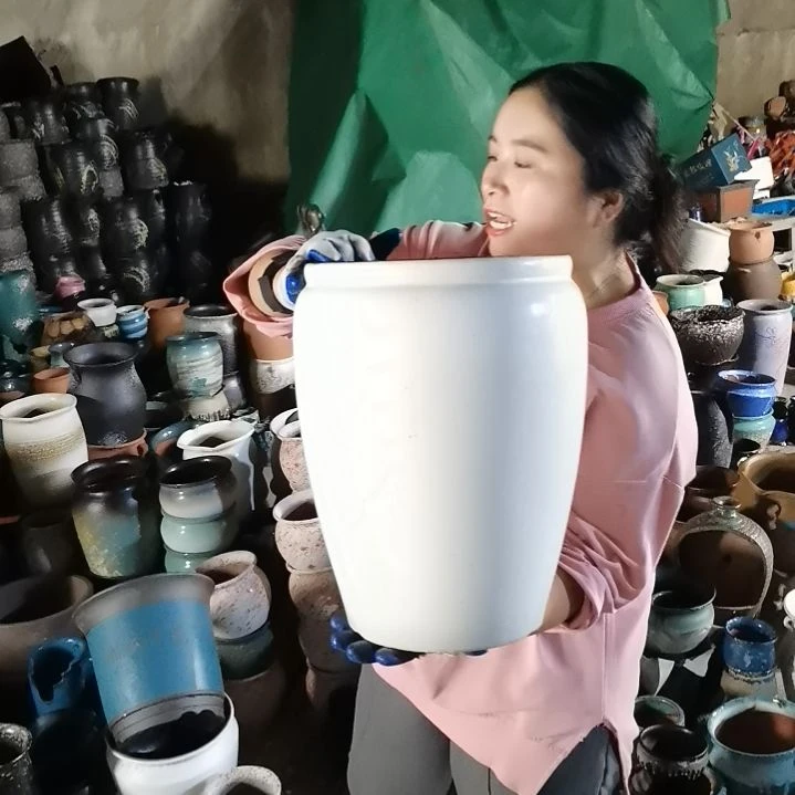 红陶口25高36瑕疵一个