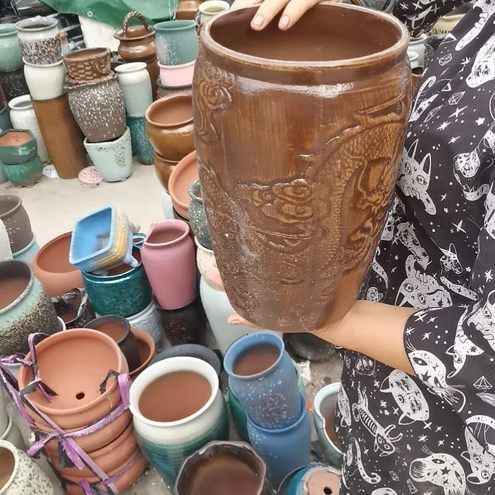 红陶20CM以下口19高31瑕疵