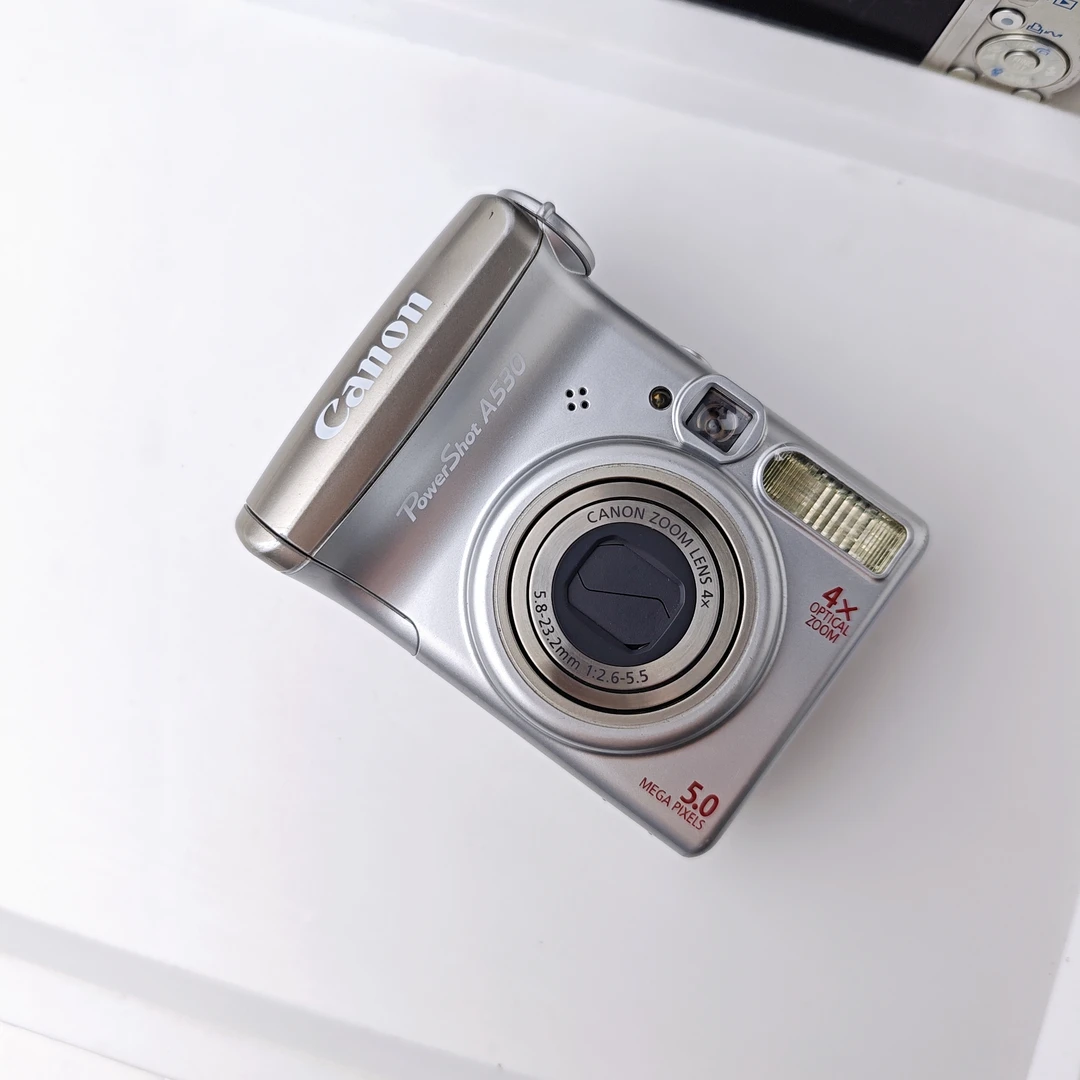 9新 Canon/佳能 a530 电池仓微瑕 500万像素4倍变焦 配件齐全