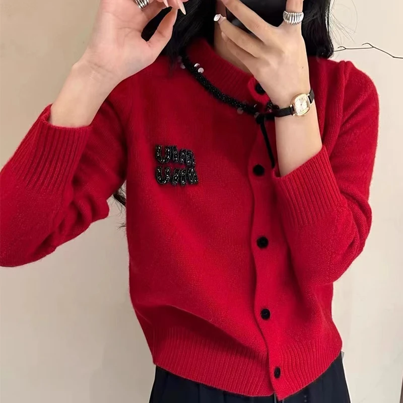 羊毛100%秋冬新款蝴蝶结纯羊毛针织衫短款外套毛衣开衫全羊毛女