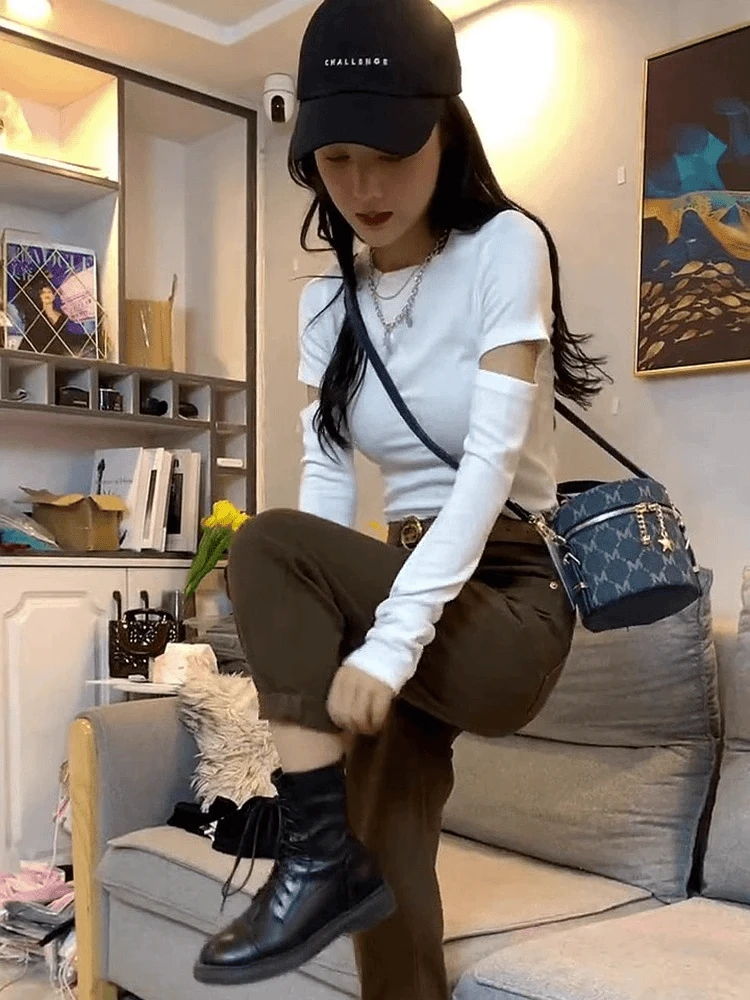 正肩时髦破洞镂空白色长袖t恤女春秋内搭韩范短款修身收腰打底衫