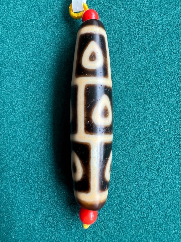 张奎5A牙黄佛心九眼天珠对孔53.2mm珠径12.8mm