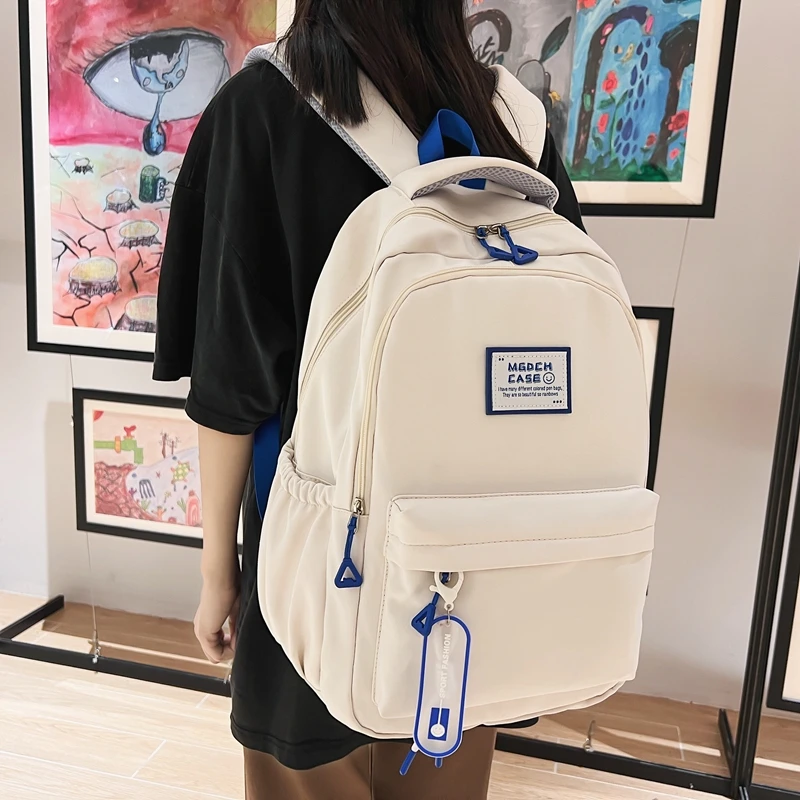 书包女生大学生2025新款简约大容量高中高颜值电脑背包双肩包0075