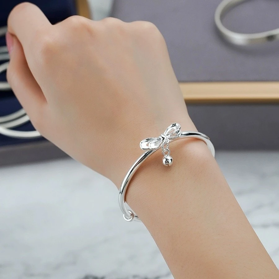 足银手镯 足银9999蝴蝶结铃铛银手镯女时尚推拉款手环礼物送女友
