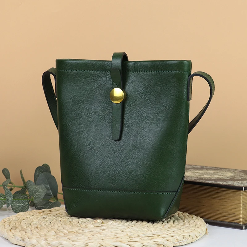 头层植鞣牛皮真皮女士单肩斜挎简约过桥水桶包包