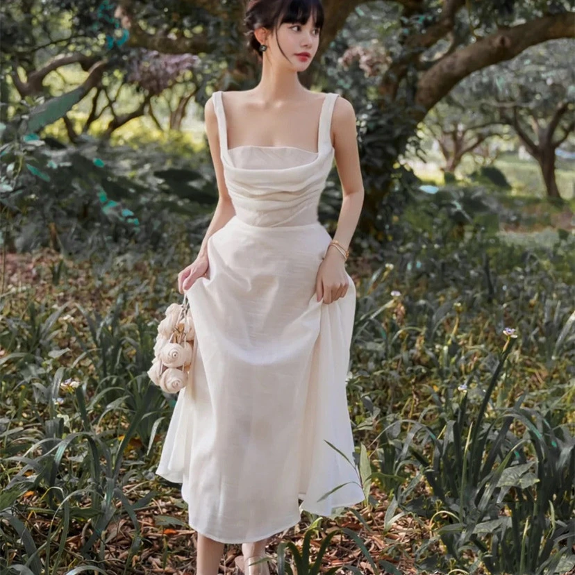 越南小众品牌白色礼服出片白月光吊带A字吊带裙长裙法式A038