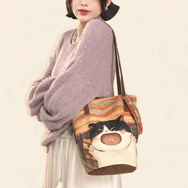 弘娜原创时尚围脖小狗单肩斜挎手提包水桶包通勤大容量单肩包女AI