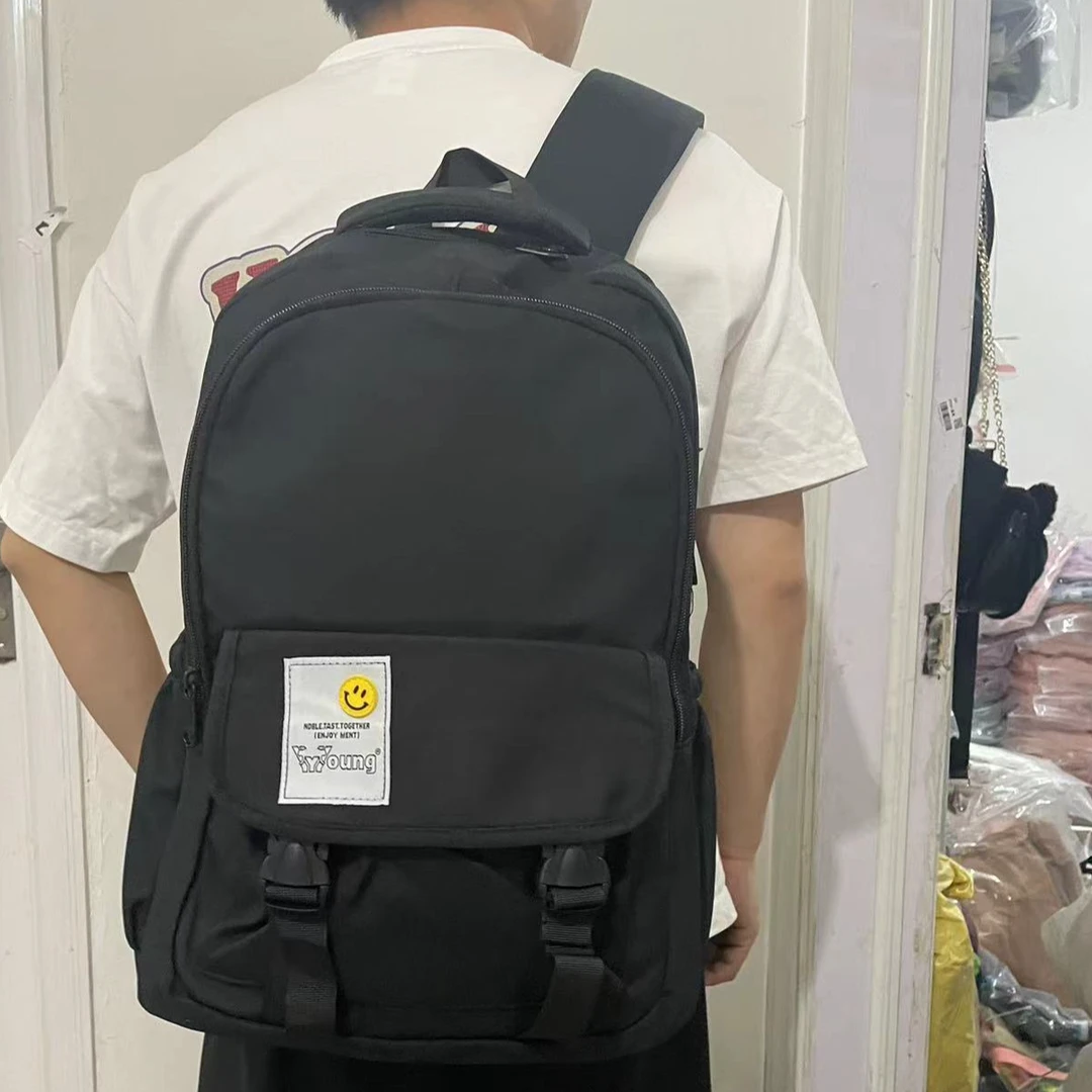 大容量双肩背包黑色学生书包初高中大学生双肩包三到六年级背包