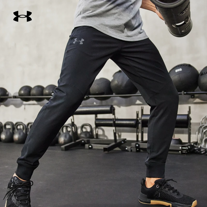 安德玛UASTORM男士户外防泼水速干欧若风运动裤训练长裤1365622