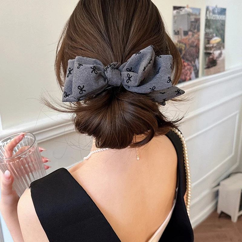 新款气质蝴蝶结丸子头发夹女高级感盘发高马尾抓夹头饰2025发饰品