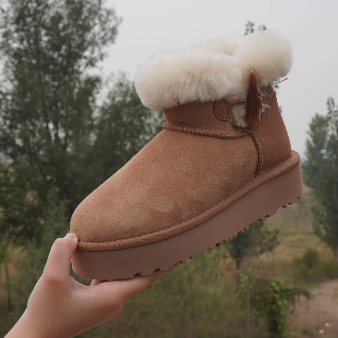 新款厚底牛角扣羊皮毛一体女士冬季雪地靴时尚百搭加绒加厚