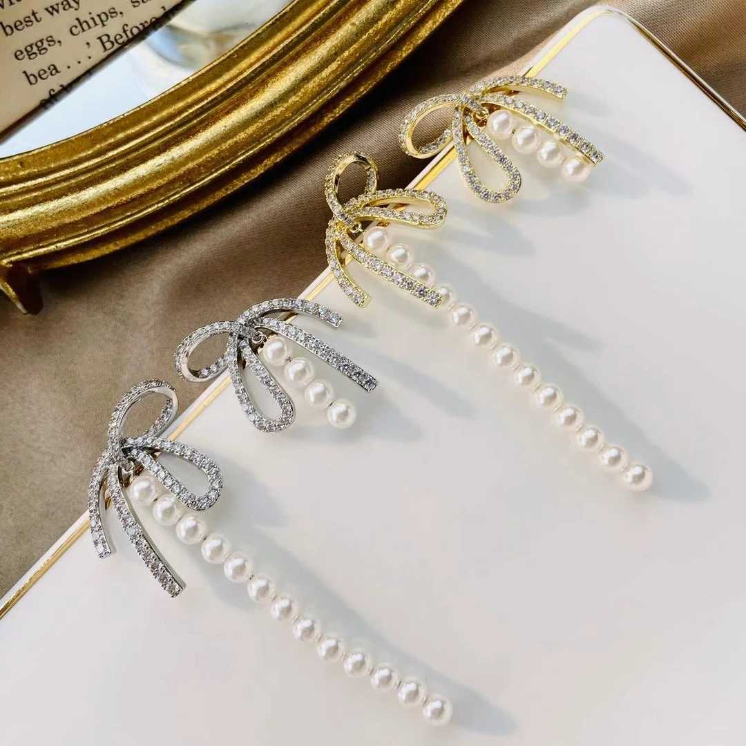 铜合金仿珍珠耳饰 a568 a569轻奢气质亮闪ab款蝴蝶结珠流苏14782