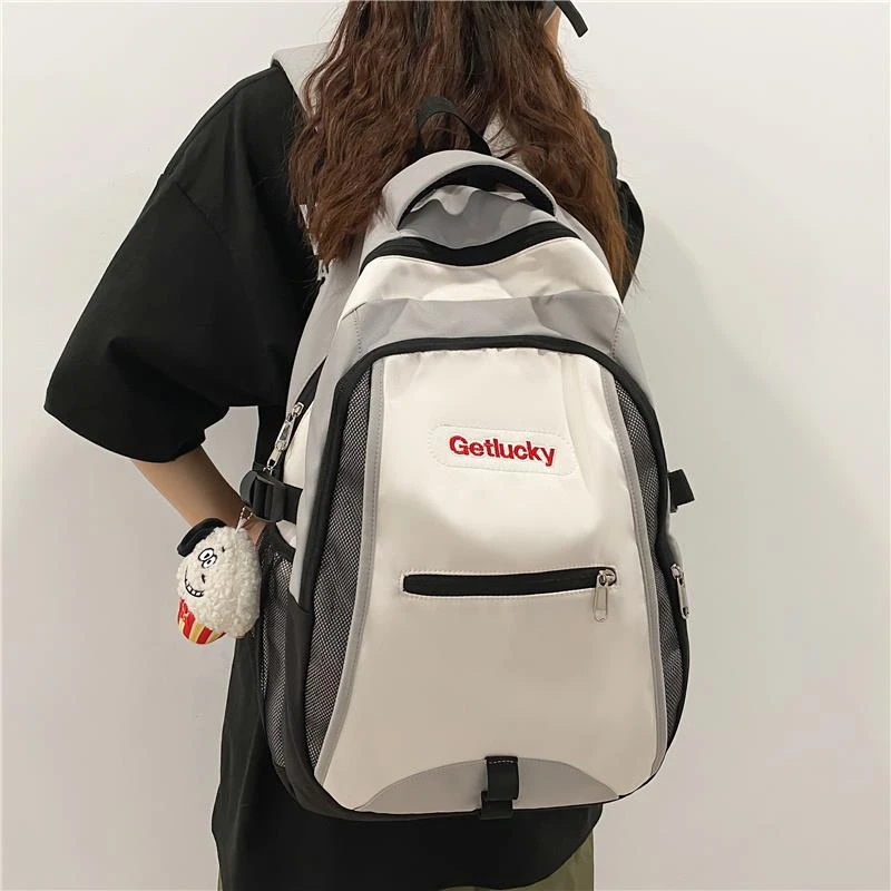 书包女初中生高中生大容量撞色日系原宿背包男大学生旅行双肩包潮