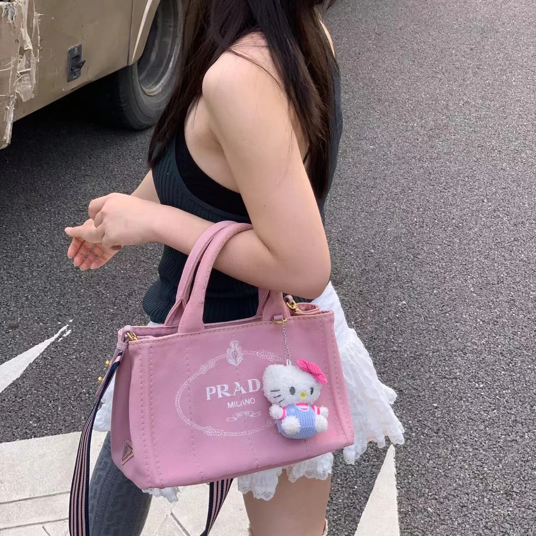 95新 Prada/普拉达 夏日必备小号粉色沙滩手提斜挎包c