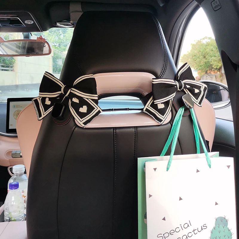 蝴蝶结车载挂钩领克比亚迪海鸥元plus一体式运动座椅背挂钩汽车上