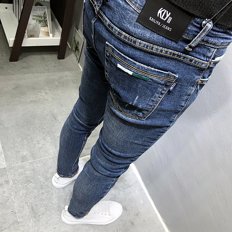 2025春季男士流行时尚百搭深蓝紧身牛仔裤男韩版修身小脚弹力九分