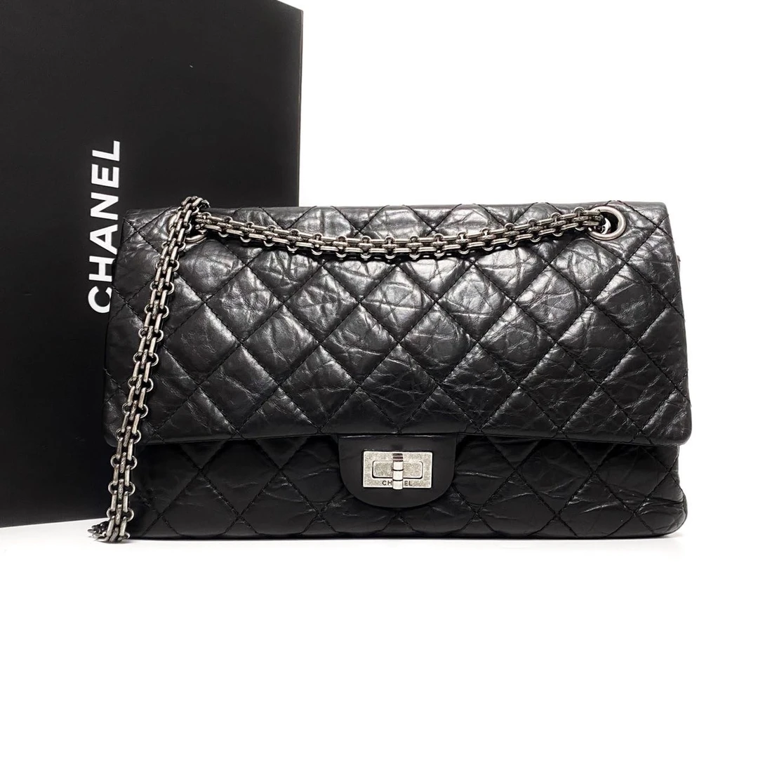 95新 Chanel/香奈儿 12开黑银牛皮2.55中号