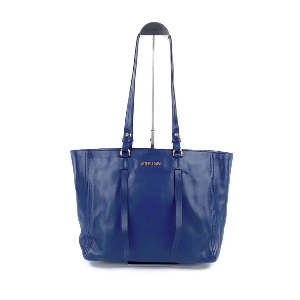95新 MIU MIU/缪缪 牛皮蓝色金标手提包