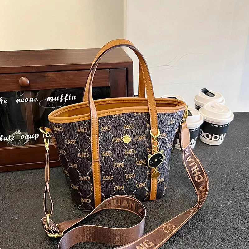 新款印花女包手提小通勤包宽肩带斜挎包