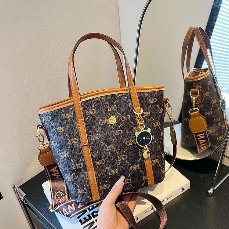 新款印花女包手提小通勤包宽肩带斜挎包