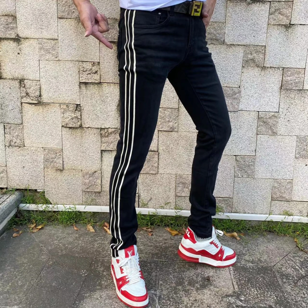 秋冬黑色高品质男士修身小脚百搭休闲时尚水洗弹力韩版织带牛仔裤