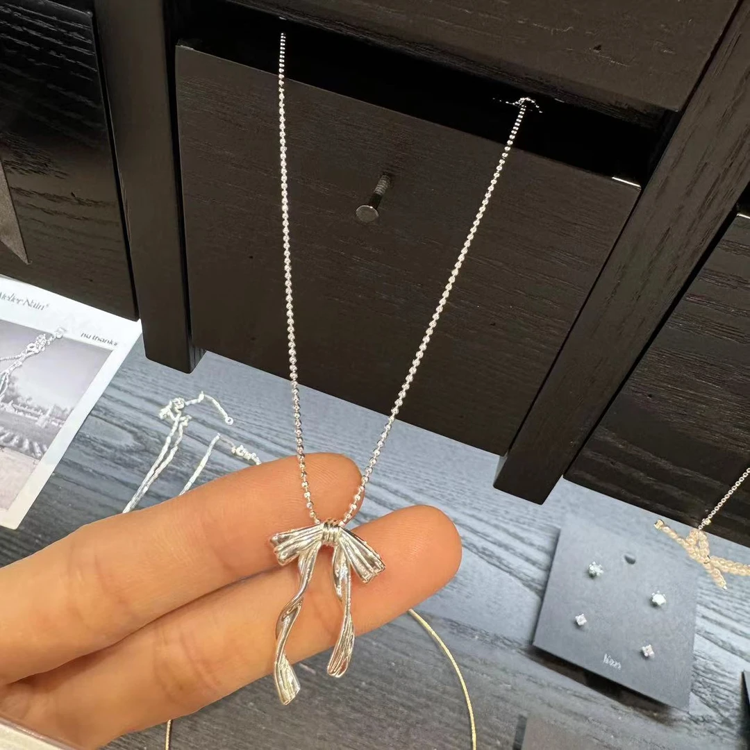 合金亚克力项链 【NO退NO换】韩国东大门秋款蝴蝶结项链