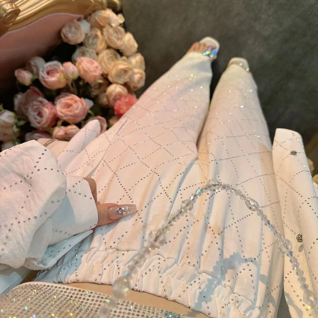 【崔】毕家索线条长裤 欧货高级感菱格重工烫钻带口袋长裤243050