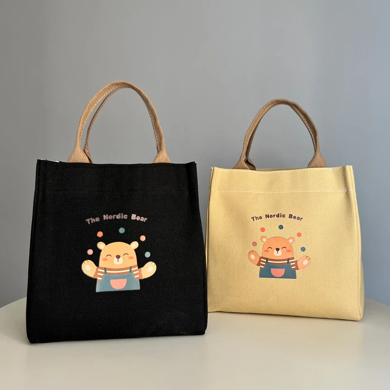 新款高颜值帆布手提包帆布包简约上班族学生拎包百搭饭盒便当包