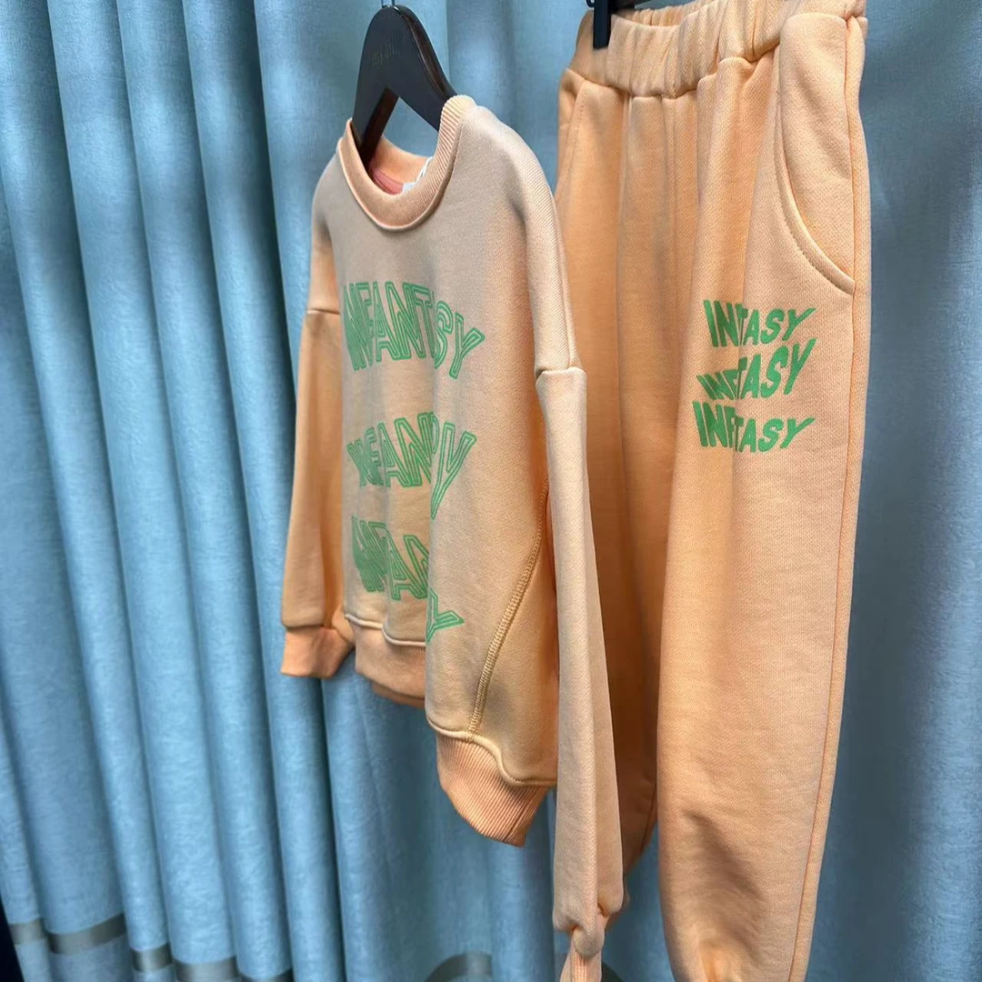 3739秋针织T恤（25B002095)(字母上订装饰链）