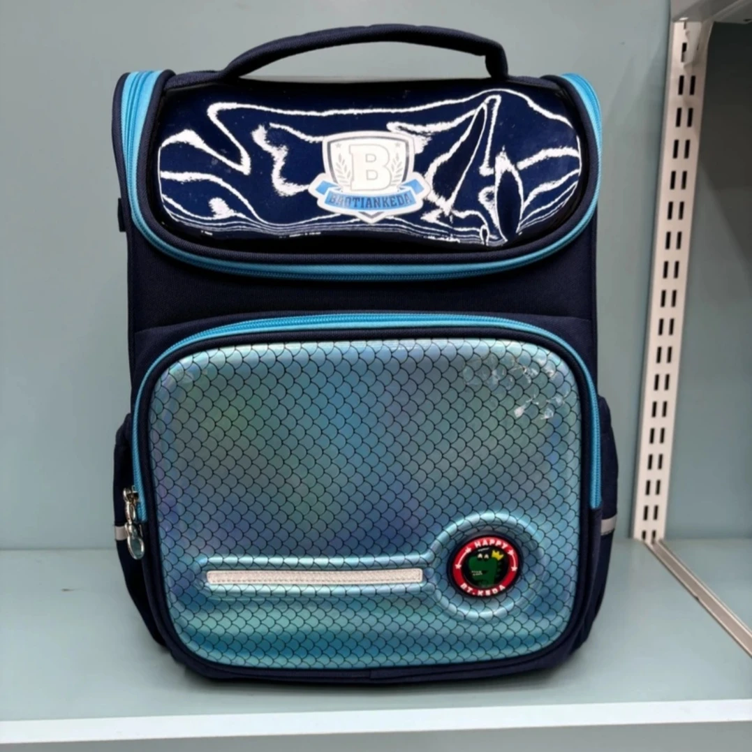 宝天科达1-3年级男生减负减压轻便大容量儿童书包（鱼鳞款）