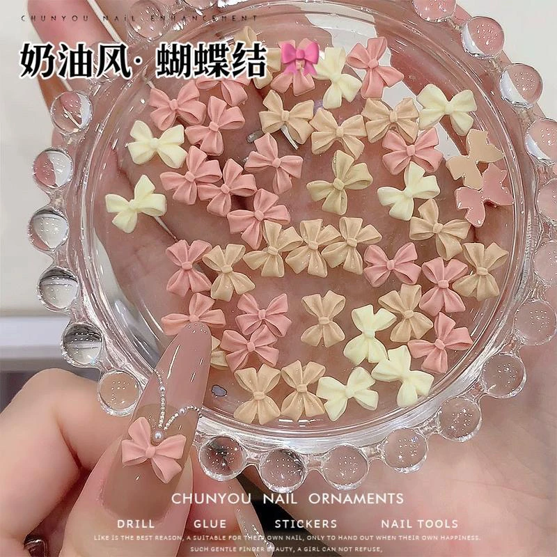 奶油粉蝴蝶结美甲钻温柔色蝴蝶结立体树脂网红新款指甲装饰品配饰