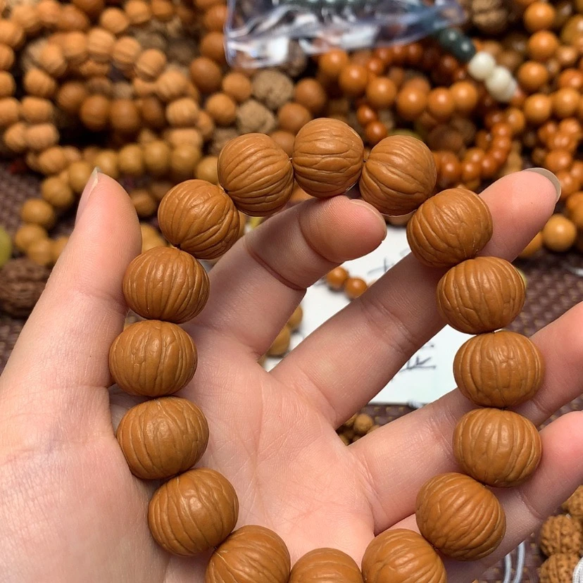 AAA猴头凤羽手串15-16mm左右凤羽猴头原皮全品无修核桃手串