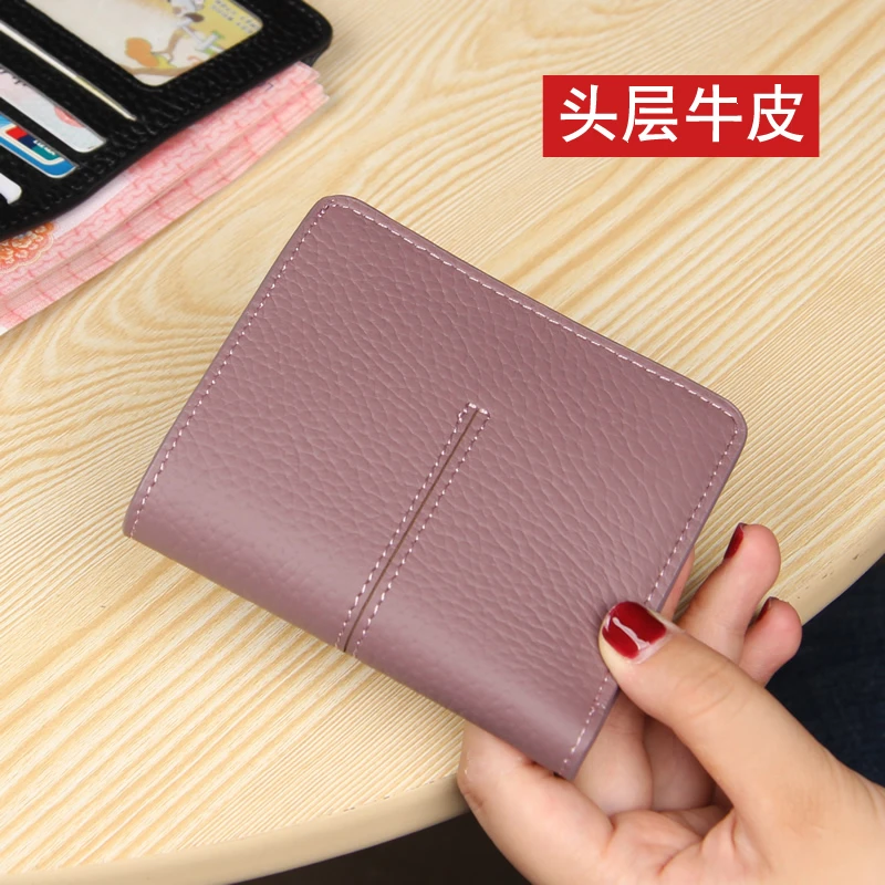 真皮钱夹女短款超薄卡包多卡位大牌两折叠牛皮小巧搭扣零钱包一体