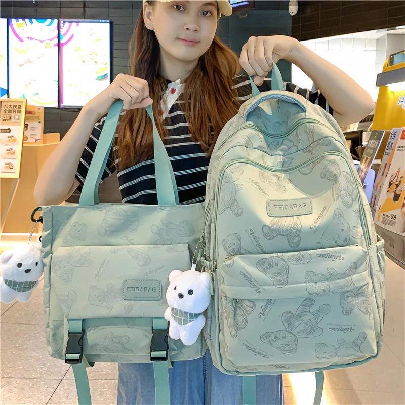 书包初中女生高颜值反光小熊高中大容量日系双肩包2024小学生背包