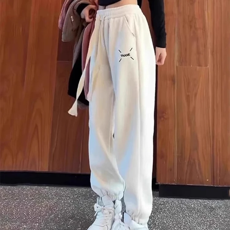 德丽妮白色运动镰刀女春秋2025新款宽松休闲裤高腰束脚裤哈伦卫裤