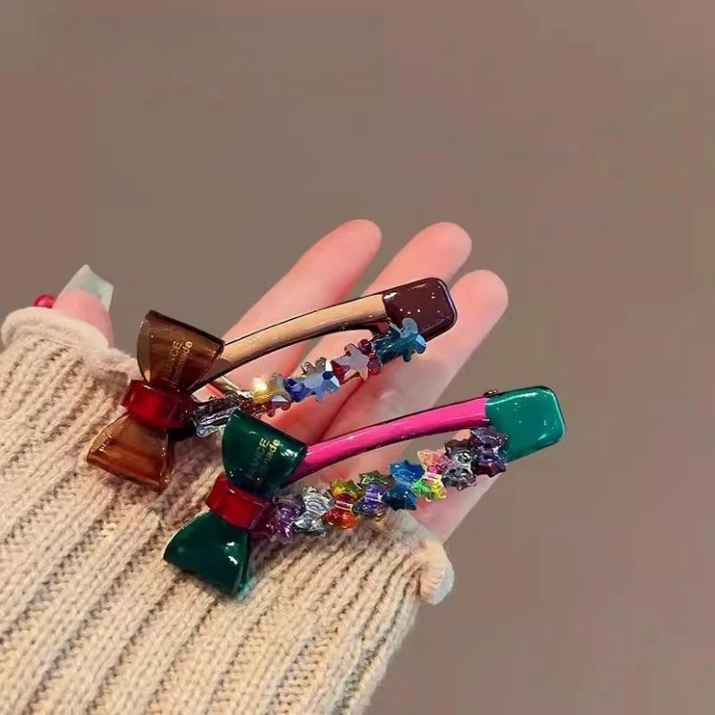 秋季时尚高级感少女彩色水晶蝴蝶结满钻质感刘海侧边夹鸭嘴夹女生