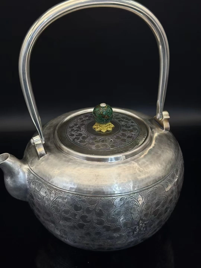 足银纯手工一张打提梁壶