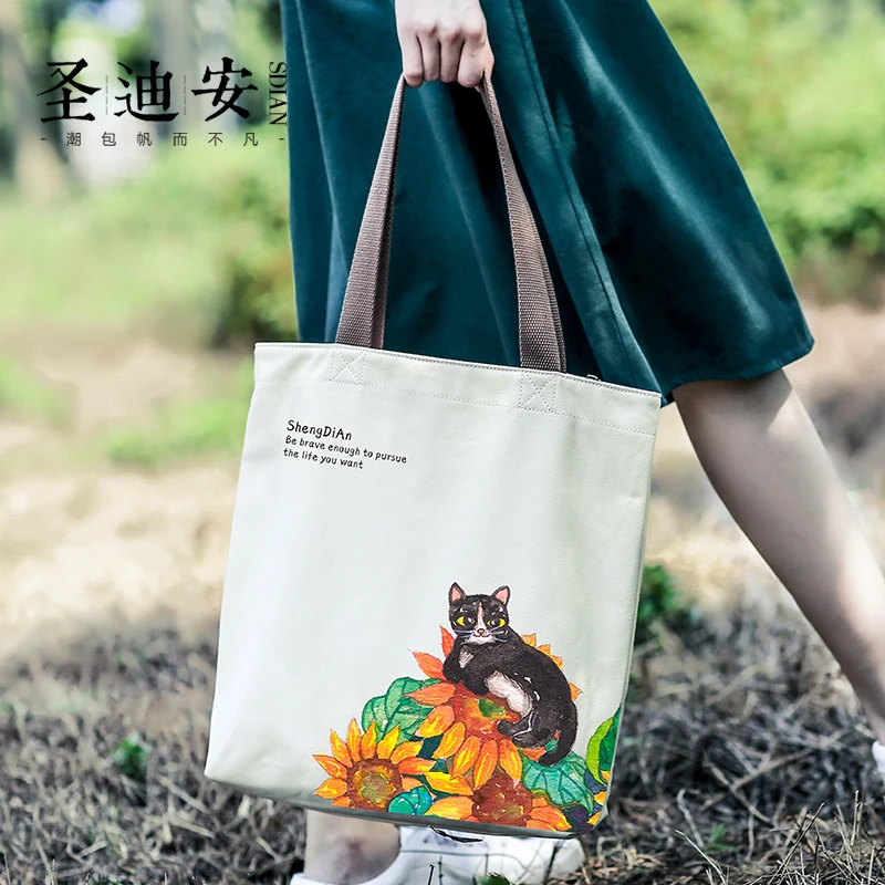 日系文艺单肩包女2024新款学生大容量小清新可爱猫咪手提帆布包女