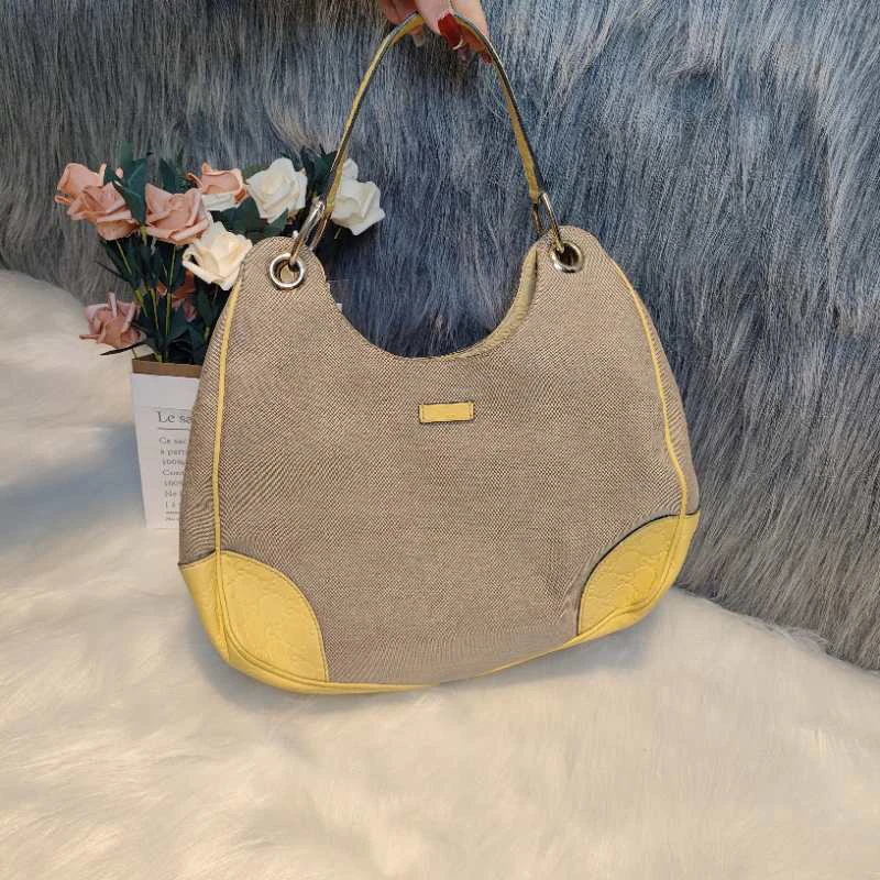 GUCCI 古驰 米色帆布黄拼皮单肩包     K02289