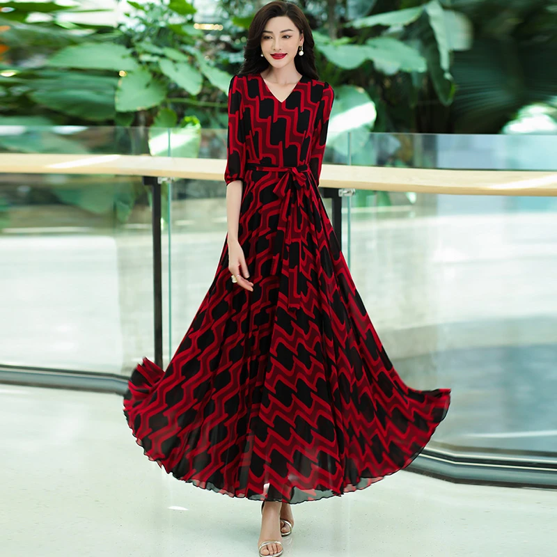 香衣丽华夏季中袖V领大摆过膝连衣裙修身显瘦花色中腰灯笼袖长裙