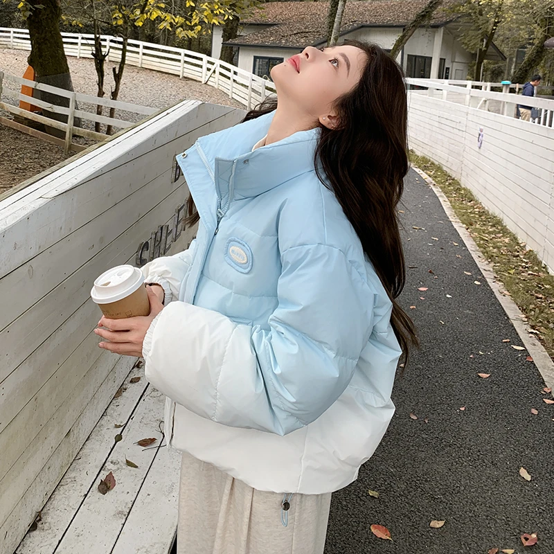 蓝色渐变立领羽绒服女2025冬季新款设计感小清新洋气减龄面包服潮