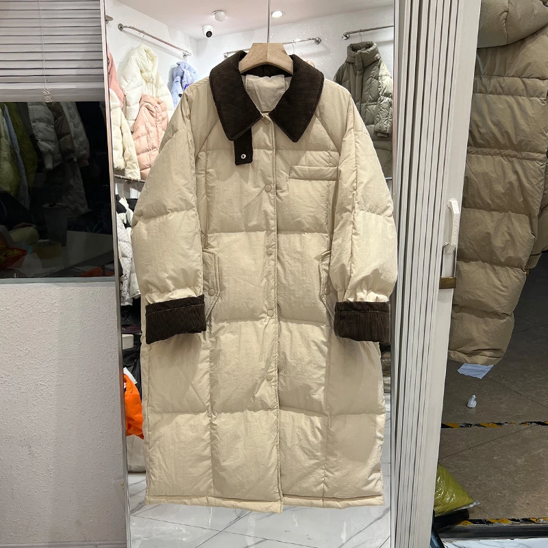 灯芯绒拼接翻领白色羽绒服女中长款韩版宽松加厚冬季新款过膝外套