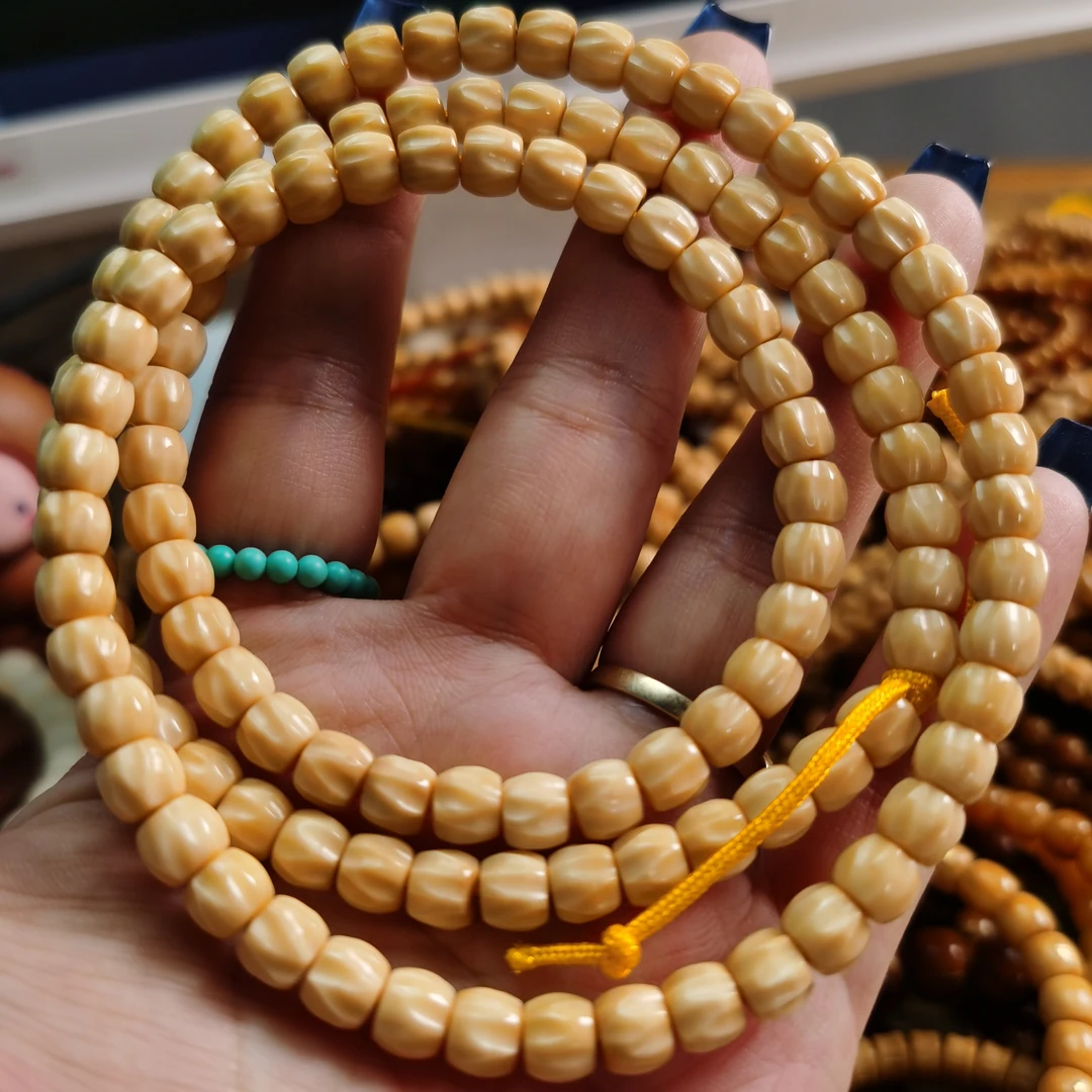 卡6.7*5.9mm龙脊菩提子蛋黄溏心料雕刻的百香籽108脖挂念珠手持