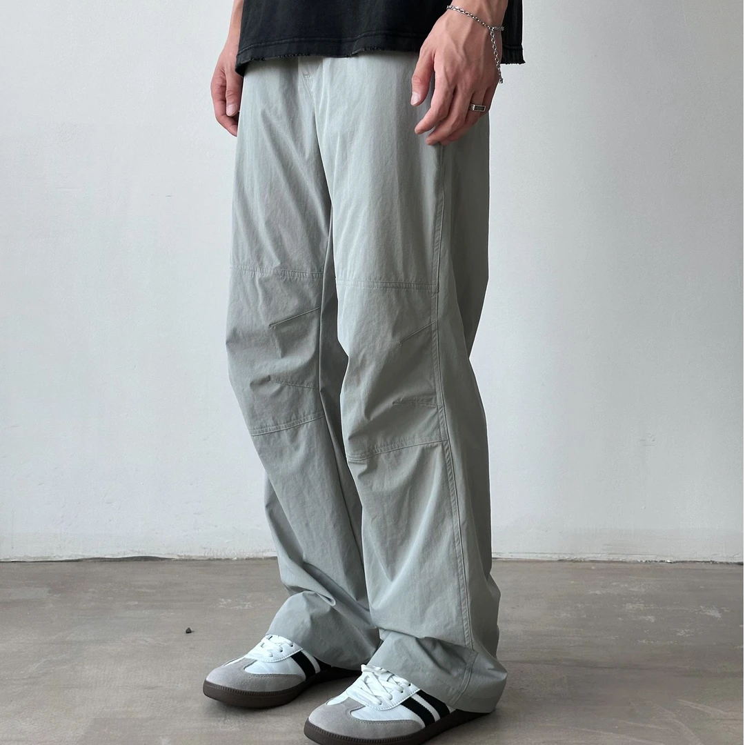 EMU  24SS 双膝立体裁剪速干微喇双倍膝盖打褶裤  小众男女休闲裤